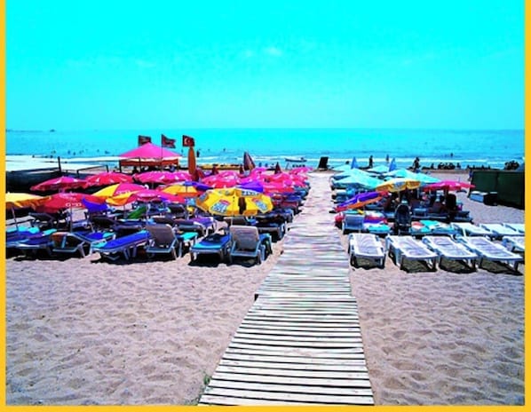 Beach nearby, sun loungers, beach umbrellas