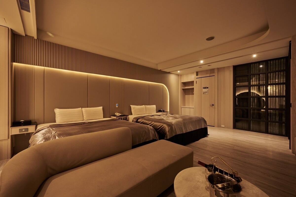 Elite Quadruple Room | 1 bedroom, down comforters, free minibar, blackout drapes