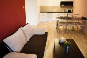 Departamento, 2 habitaciones (6 persons) | Área de sala de estar | Televisión de pantalla plana 