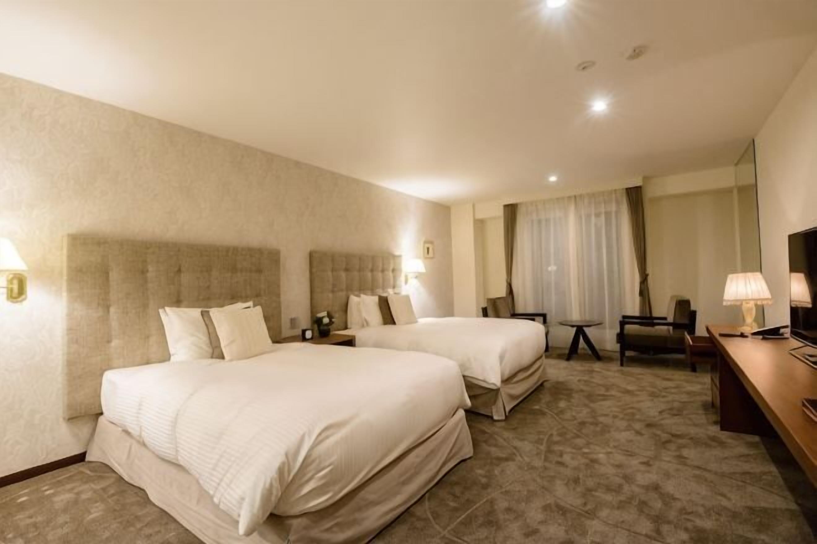Ropa de cama de alta calidad y minibar 