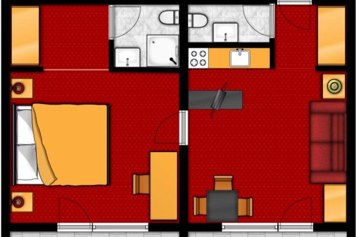 A hotel room layout with a kitchen, dining area, and a patio.