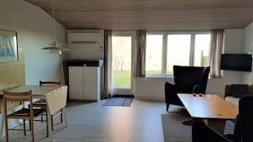 Apartment, 1 Bedroom, Terrace, Sea View (B) | Living area | 20-inch flat-screen TV with cable channels, TV