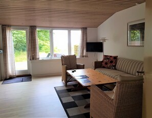 Apartment, 1 Bedroom, Terrace, Sea View (B) | Living area | 20-inch flat-screen TV with cable channels, TV