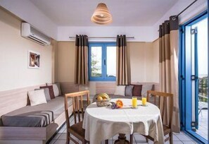 Apartment, 1 Bedroom, Sea View | Living area