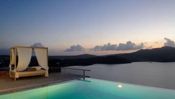 Outdoor pool, pool umbrellas, pool loungers