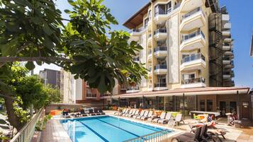Outdoor pool, pool umbrellas, pool loungers