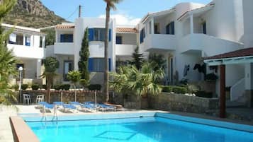 Outdoor pool, pool umbrellas, pool loungers