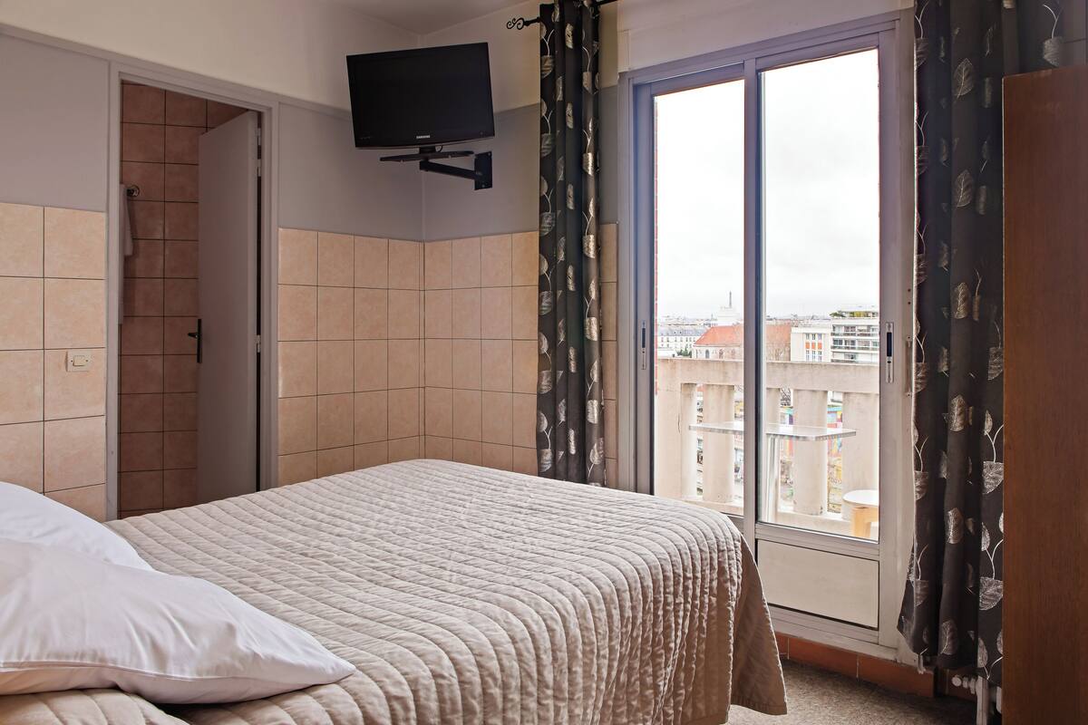 Desk, laptop workspace, blackout curtains, free WiFi