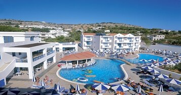Seasonal outdoor pool, open 9 AM to 7 PM, pool umbrellas, sun loungers