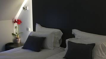 Hochwertige Bettwaren, Minibar, Zimmersafe, individuell dekoriert