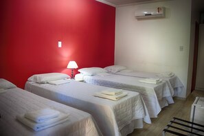 Standard Quadruple Room, Balcony | Minibar, individually decorated, individually furnished, desk