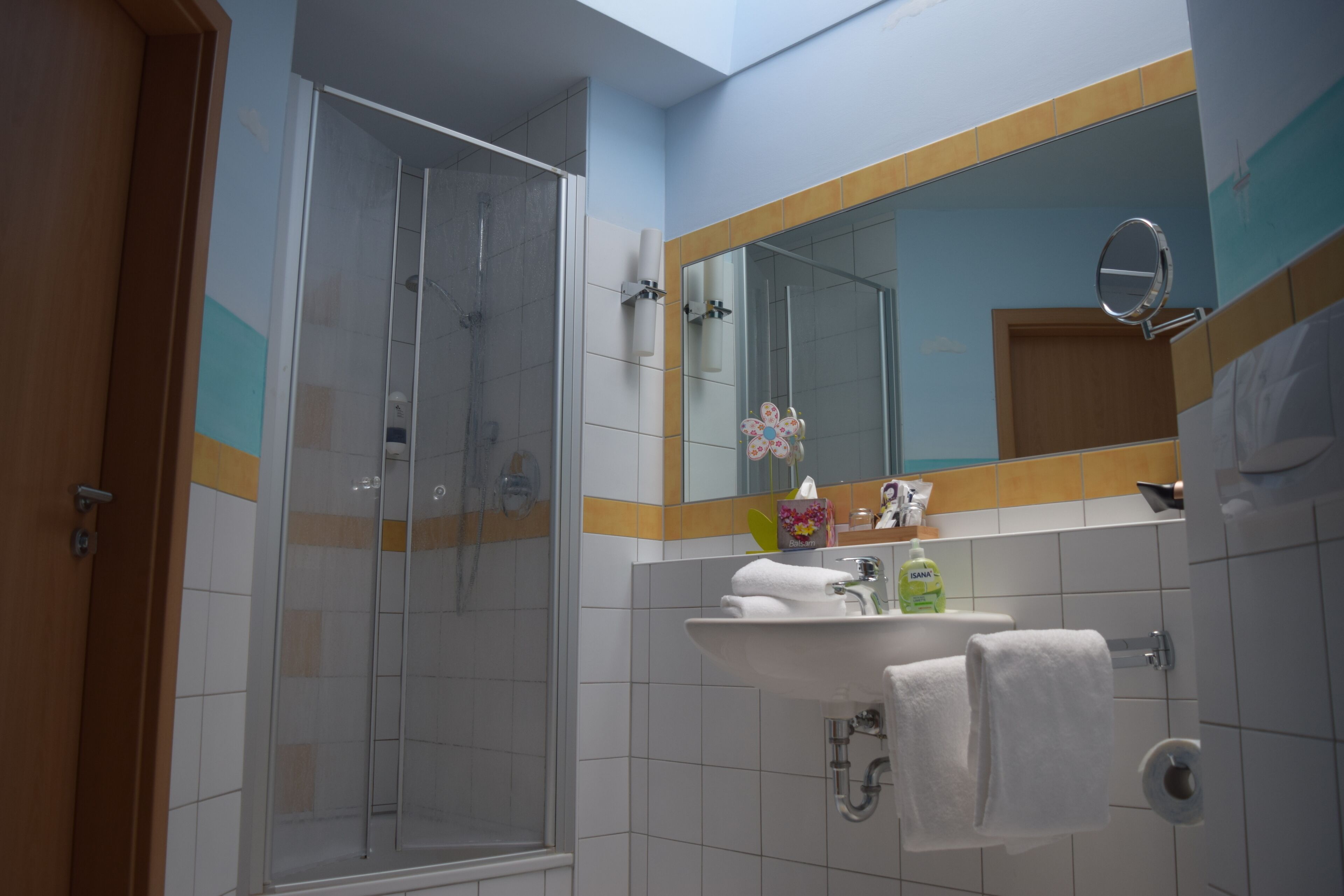 deep-soaking bathtub, designer toiletries, hair dryer, towels