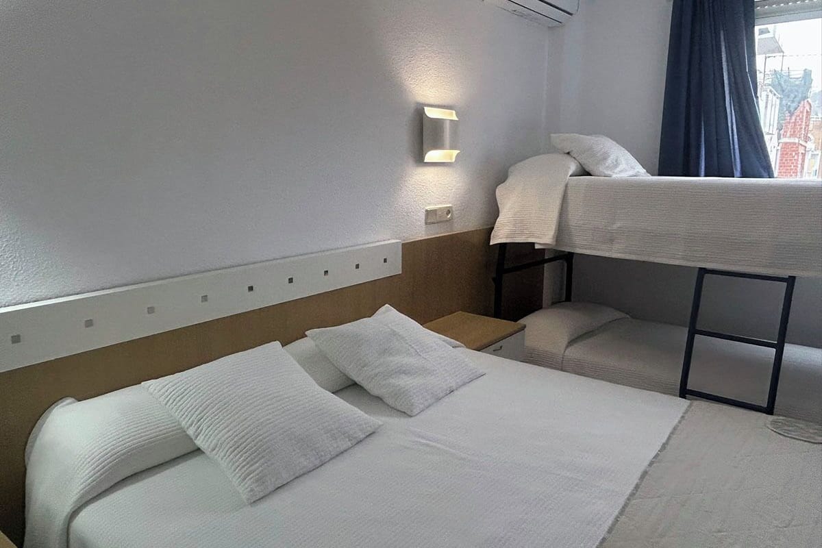 family quadruple room, 1 bedroom | 1 bedroom, in-room safe, desk, laptop workspace