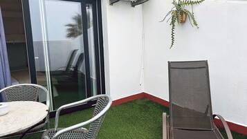Deluxe vierpersoonskamer | Terras