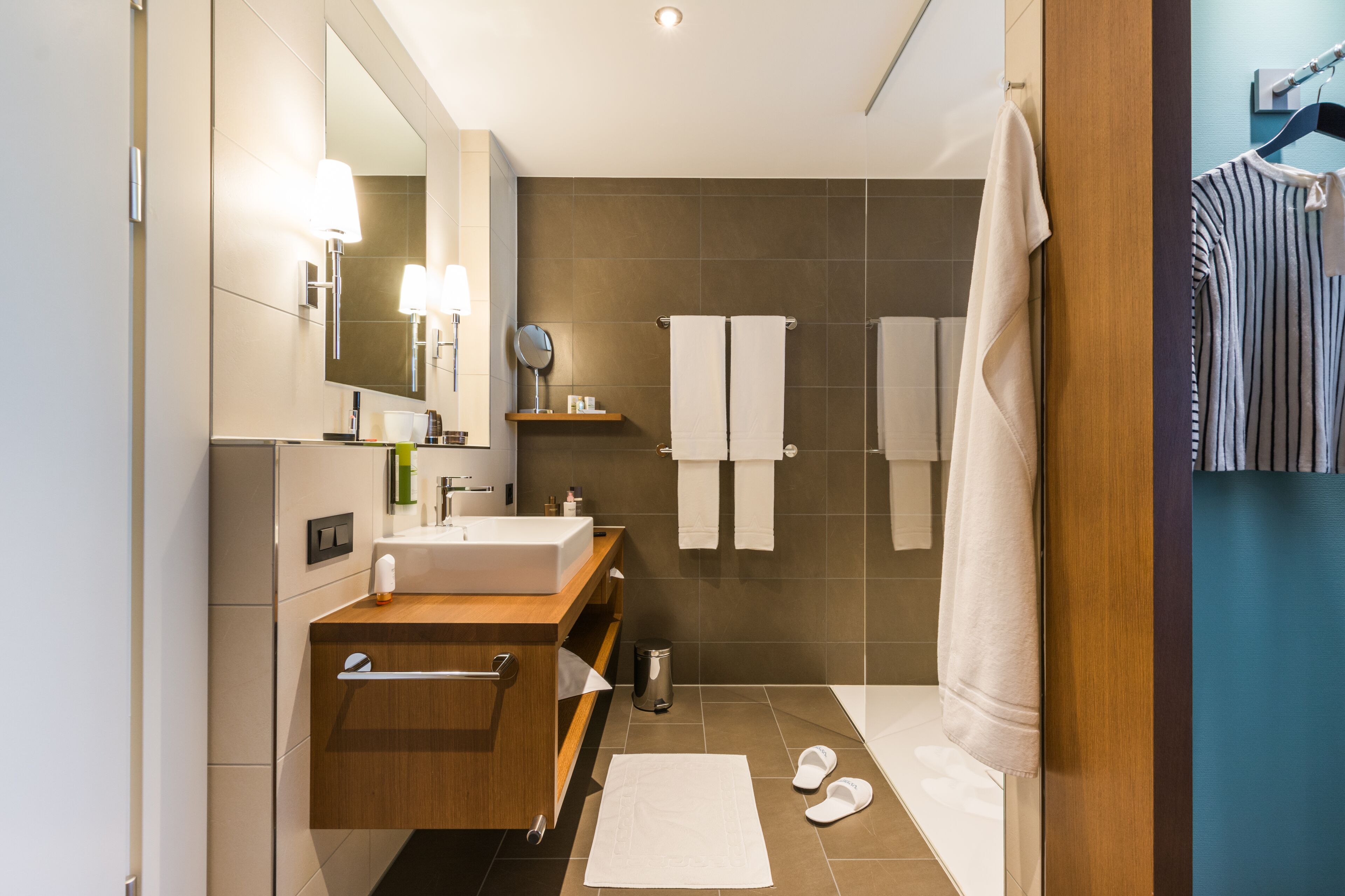 hair dryer, bathrobes, towels, soap