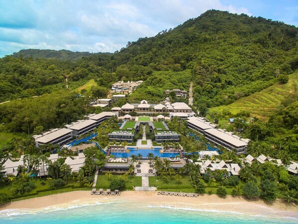 A resort with a central pool, beachfront, and lush greenery. - Phuket Marriott Resort and Spa, Nai Yang Beach (Sa Khu)
