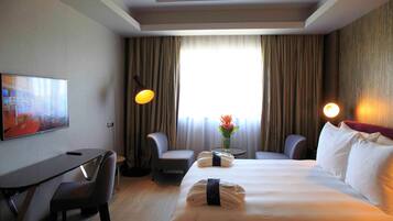 Ropa de cama de alta calidad y minibar