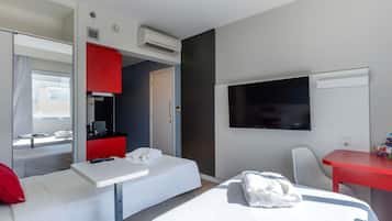 Standard Apartment, 2 Twin Beds | Minibar, in-room safe, desk, blackout drapes