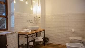 Suite, 2 Bedrooms | Bathroom | Free toiletries, hair dryer, bidet, towels