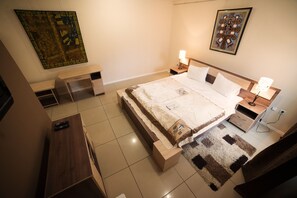 Junior Suite, Jetted Tub | Minibar, in-room safe, iron/ironing board, free cots/infant beds