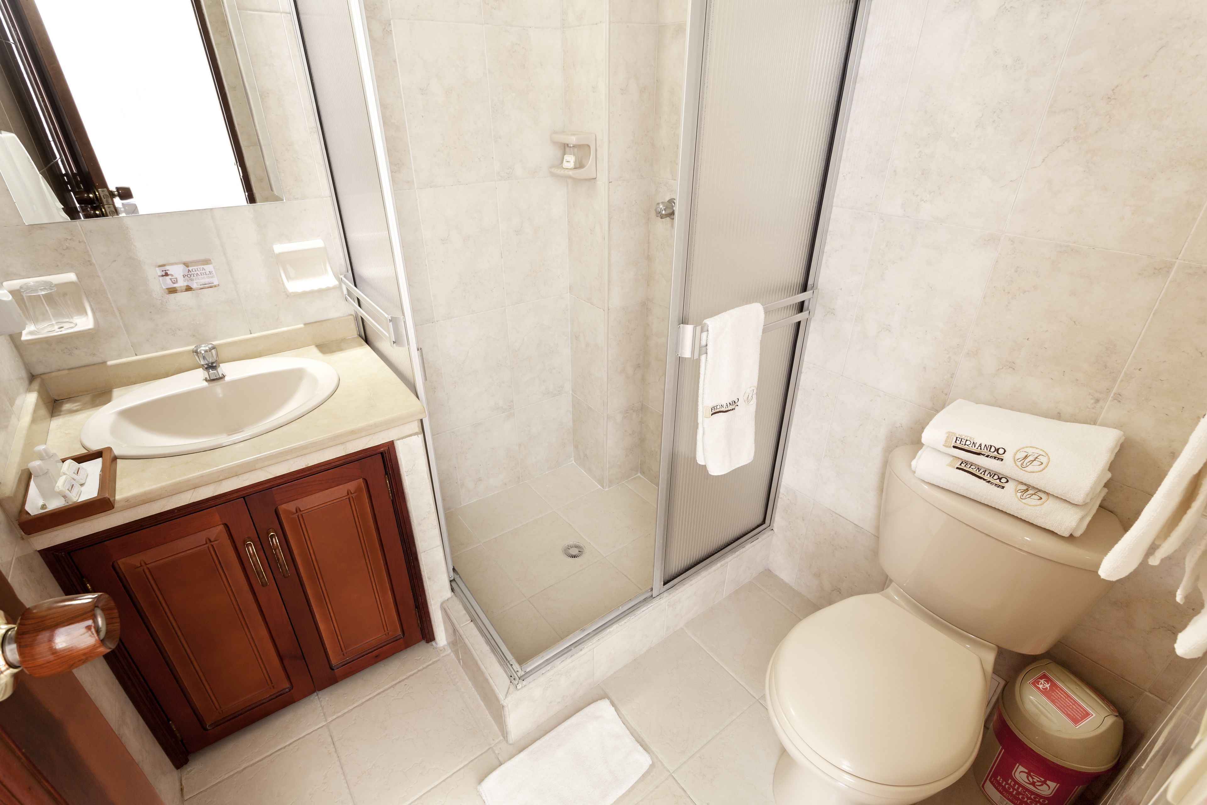 standard single room | bathroom | shower, free toiletries, hair dryer, towels