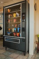 A vending machine with various snack options.