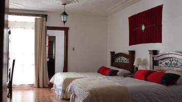 Family Room | Egyptian cotton sheets, down comforters, in-room safe, desk