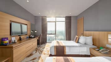 Deluxe Twin | Minibar, in-room safe, desk, blackout curtains