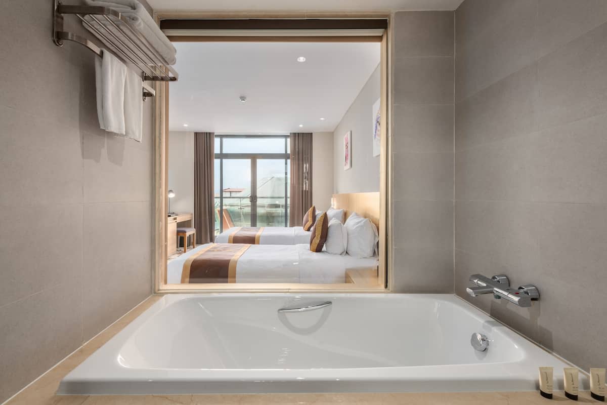 combined shower/bathtub, free toiletries, hair dryer, bathrobes