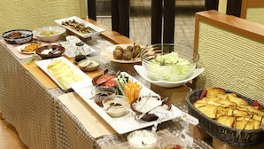 A buffet table with various food items and condiments. - Yunokawa Onsen Emi Hakodateya (Hakodate)