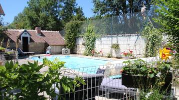 Outdoor pool, open 4:30 PM to 8:00 PM, pool umbrellas, sun loungers