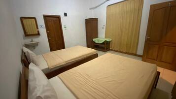 Standard Room AC | Desk, bed sheets