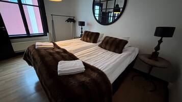 Economy Studio | 1 bedroom, iron/ironing board, free WiFi, bed sheets