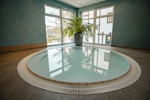 Indoor pool, open 10:00 AM to 9:00 PM, sun loungers, lifeguards on site