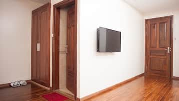 Family Shared Dormitory, 1 Bedroom, Bathtub, City View | 1 bedroom, minibar, desk, blackout drapes