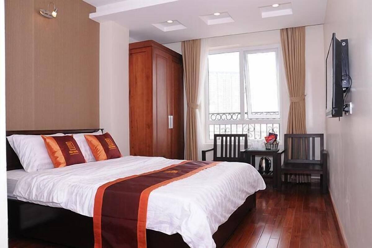 Deluxe Room, City View | Minibar, desk, blackout drapes, WiFi (free)