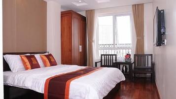 Habitació Deluxe, vistes a la ciutat | 1 dormitori, minibar, escriptori i cortines opaques