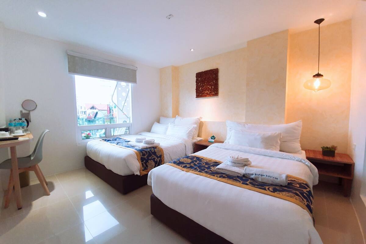 deluxe triple room | premium bedding, in-room safe, desk, blackout curtains