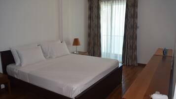 Luxury Apartment, 2 Bedrooms, Beach View, Oceanfront | 2 bedrooms, desk, iron/ironing board, rollaway beds