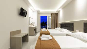 Deluxe Apartment, Pool View | In-room safe, desk, blackout drapes, soundproofing