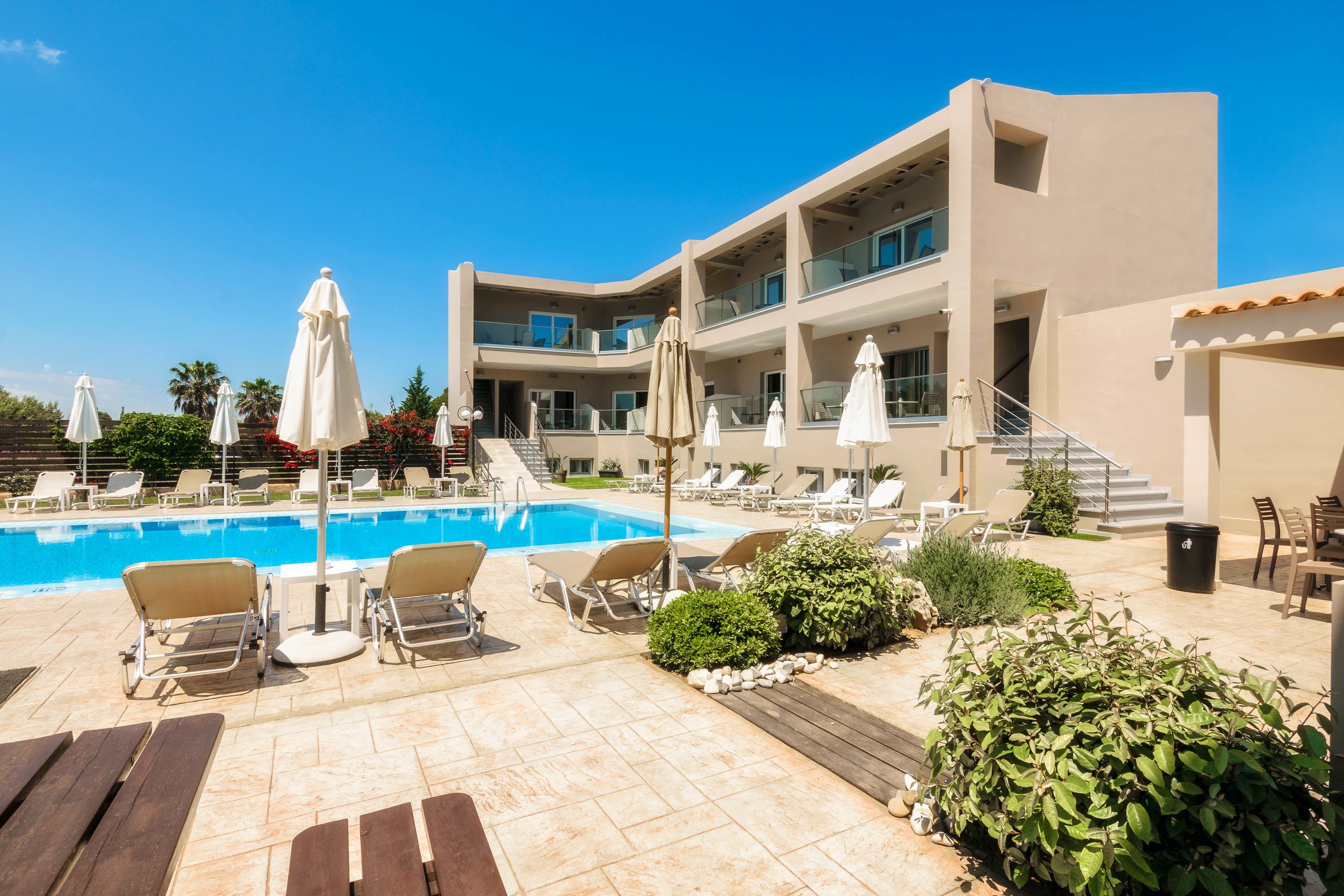 outdoor pool, pool umbrellas, pool loungers