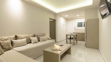 Deluxe Apartment, 2 Bedrooms | Living area | 21-inch flat-screen TV with satellite channels, TV, table tennis