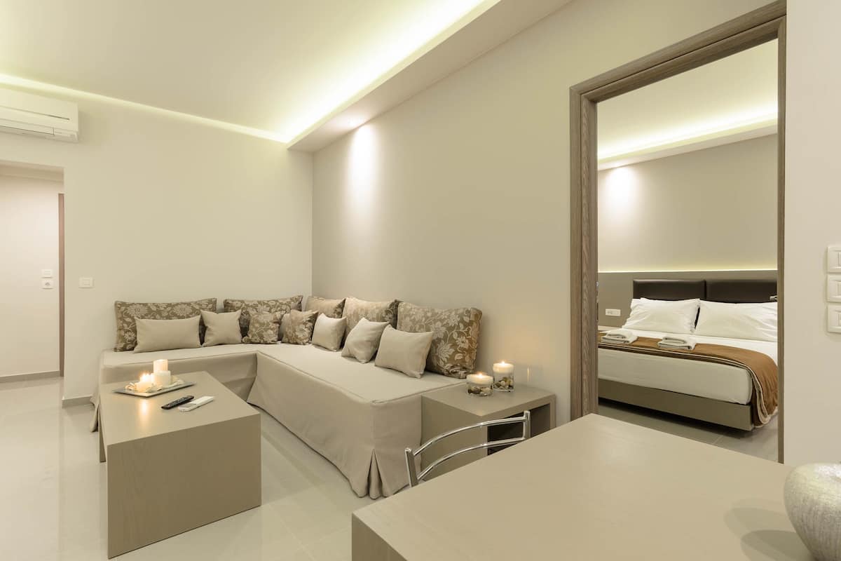 Deluxe Apartment, 2 Bedrooms | Living area | 21-inch flat-screen TV with satellite channels, TV, table tennis