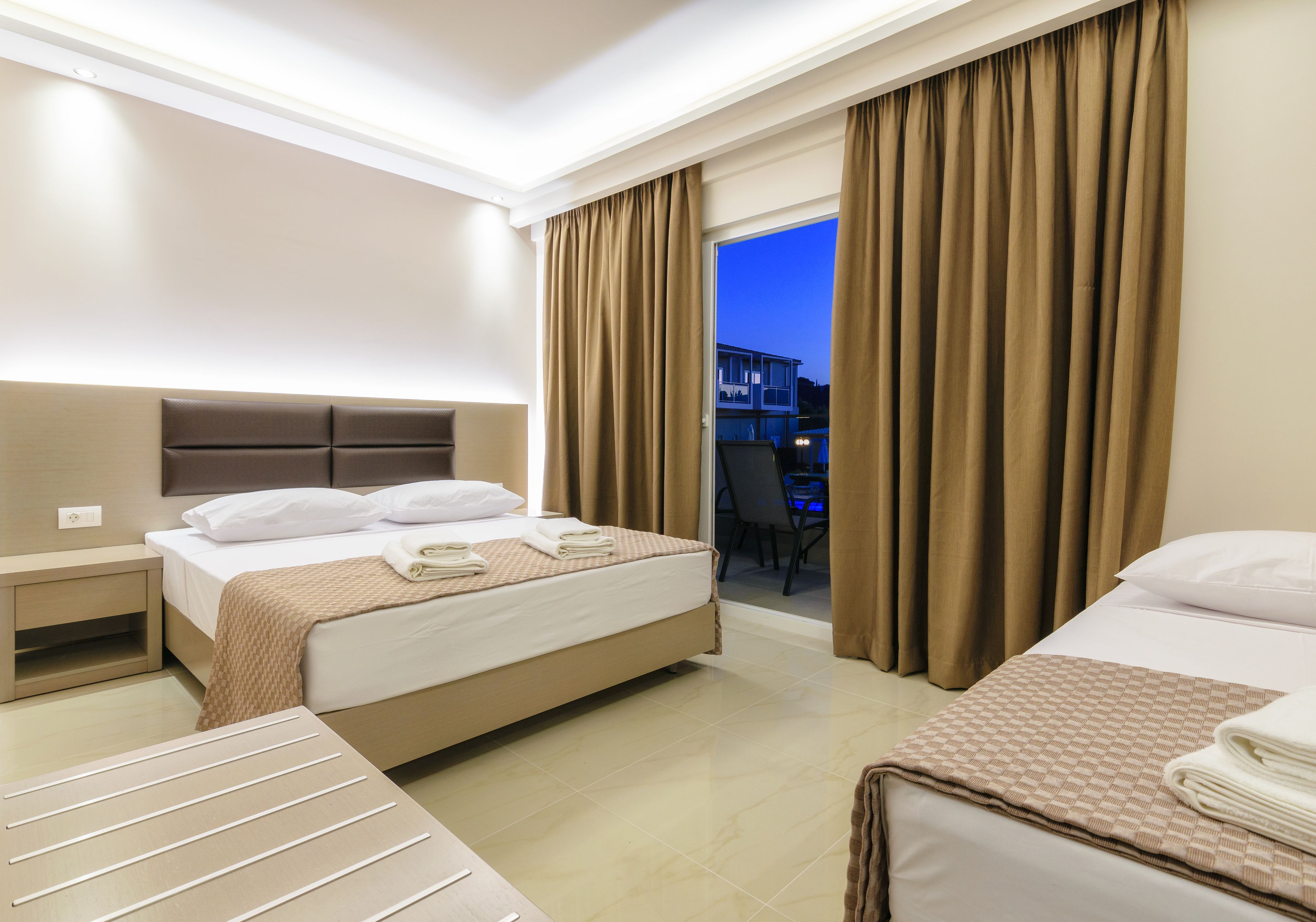 apartment, pool view | in-room safe, desk, blackout curtains, soundproofing
