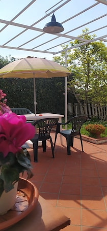 Terraza o patio. Camere Riviera di Ulisse