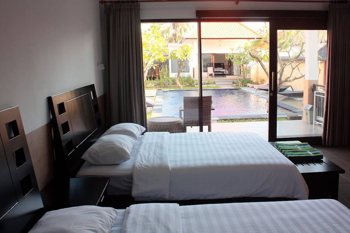 deluxe cottage | minibar, in-room safe, desk, cots/infant beds