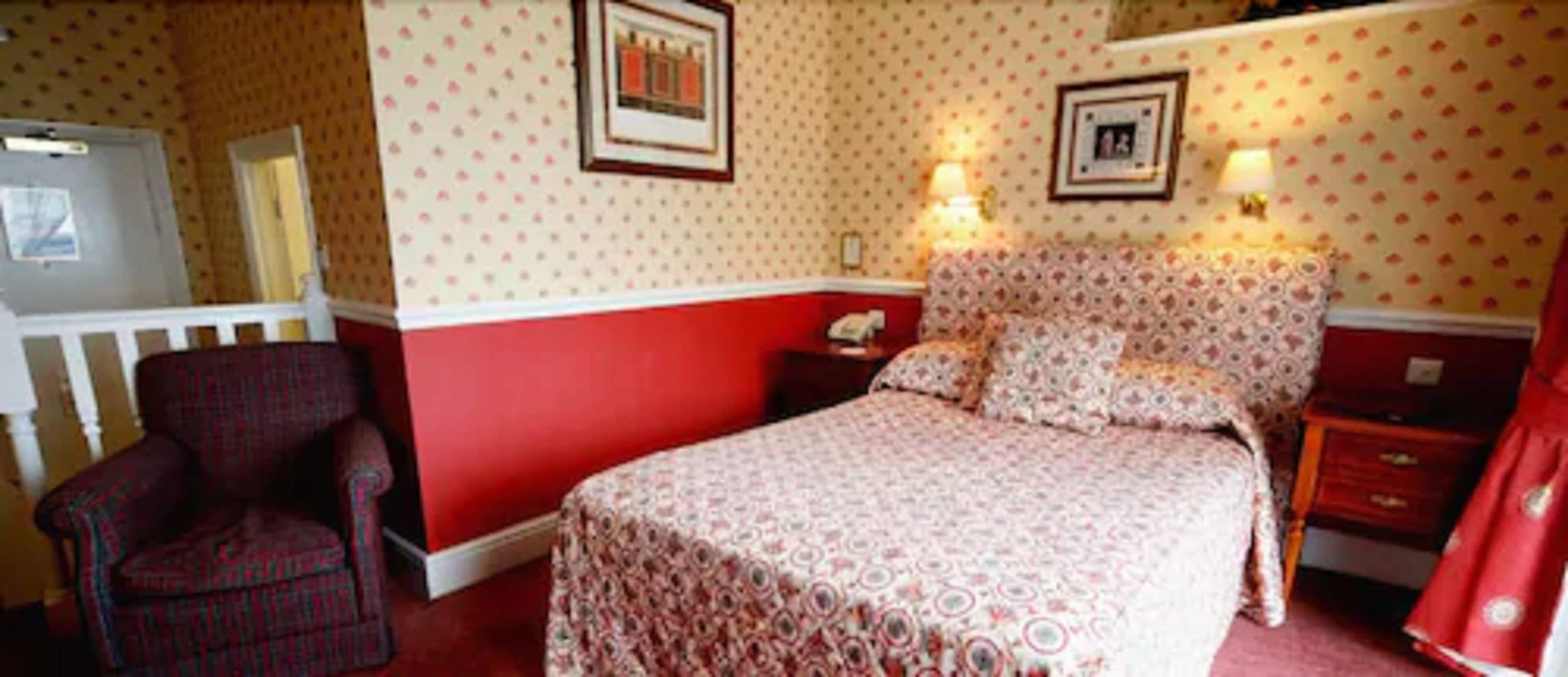 desk, blackout curtains, iron/ironing board, free cots/infant beds