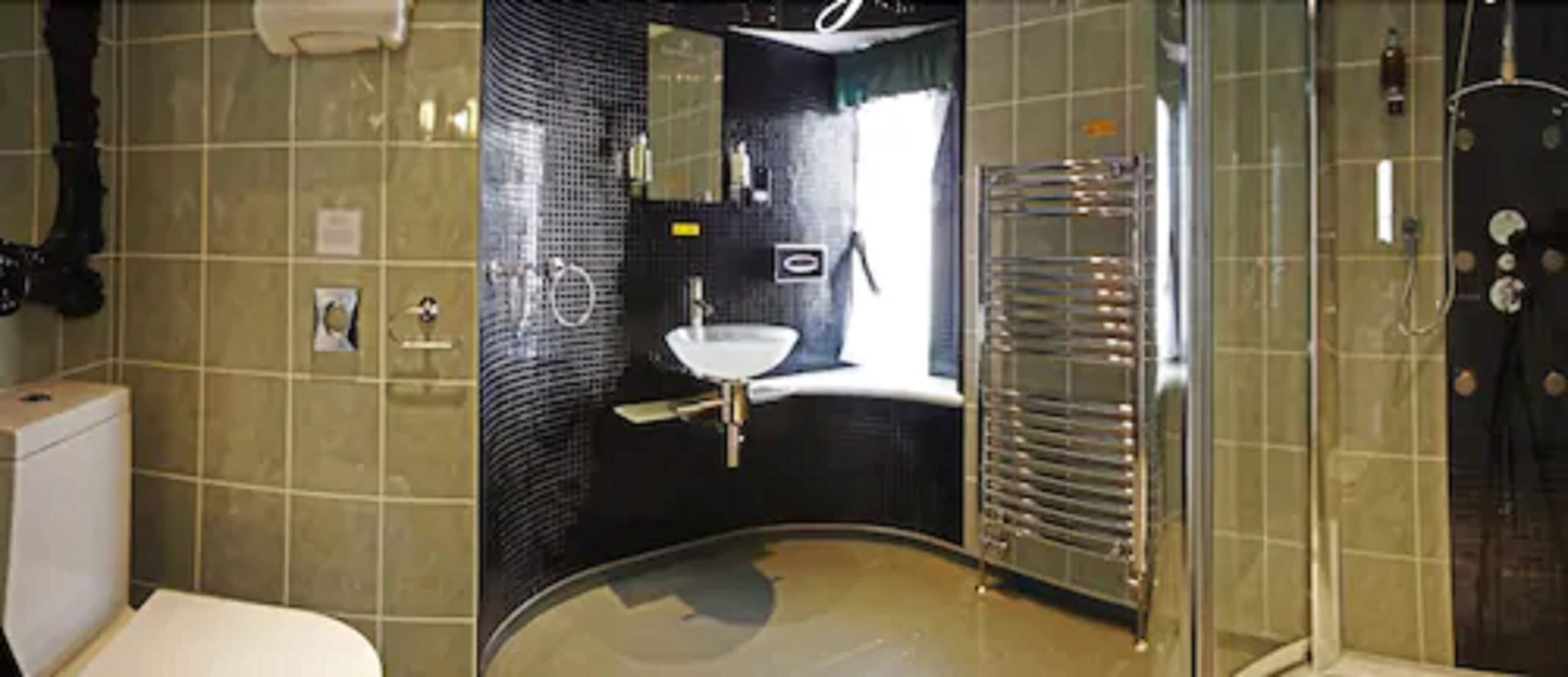 desk, blackout curtains, iron/ironing board, free cots/infant beds