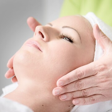 A person receiving a facial treatment.