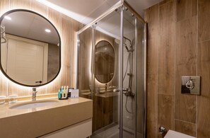 Shower, hair dryer, slippers, towels